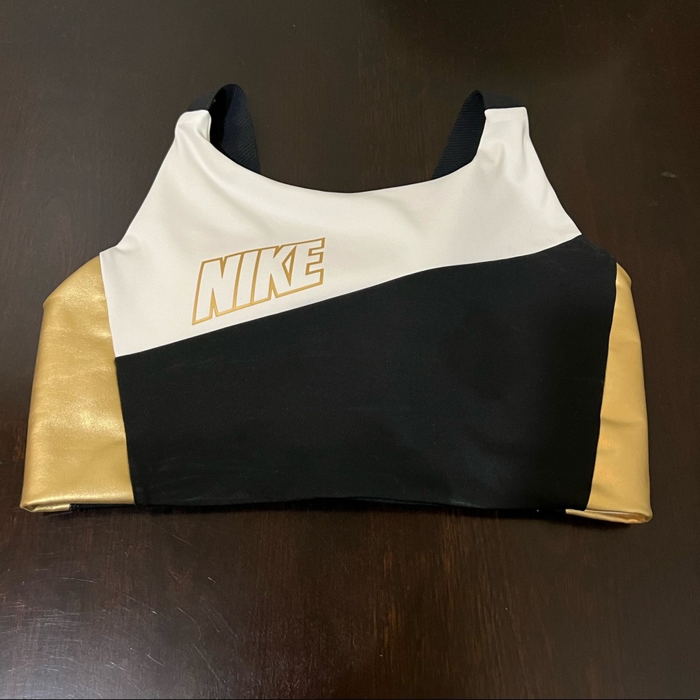 Black gold and white Nike Sports bra